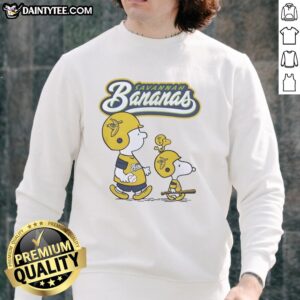 Original Peanuts characters and Savannah Bananas graphic sweatshirt featuring vibrant designs and playful imagery.