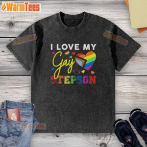 Colorful 'I Love My Gay Stepson' LGBT Pride washed t-shirt displayed on a hanger, celebrating inclusivity and love.
