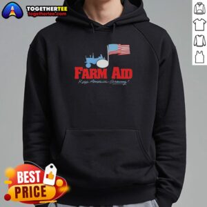 Alt Text: Premium Farm Aid hoodie featuring a tractor logo and American flag, symbolizing support for American farmers.