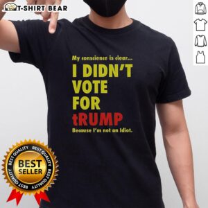 Official My Conscience Is Clear I Didn't Vote For Trump T-Shirt featuring bold text design on a casual tee.