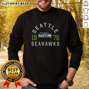 Alt Text: Hot Seattle Seahawks Heritage Print Sweatshirt featuring bold team colors and logo, perfect for game day style.