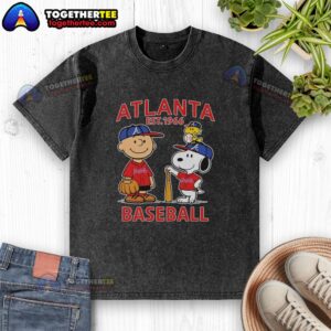 Charlie Brown, Snoopy, and Woodstock wearing Atlanta Braves baseball jersey, Est. 1961, on a washed t-shirt.