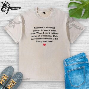 Good Sabrina in a stylish washed t-shirt, showcasing her friendly demeanor as the best person to work with ever.