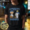Alt Text: Charlie Brown, Snoopy, and Woodstock wearing Kansas City Royals baseball jersey Est 1969 on a stylish t-shirt.