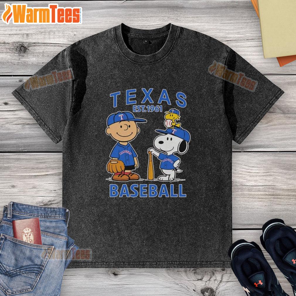 nice-charlie-brown-snoopy-and-woodstock-with-texas-rangers-baseball-jersey-est-1961-washed-t-shirt Alt Text: Charlie Brown, Snoopy, and Woodstock wearing a Texas Rangers baseball jersey est. 1961 on a washed t-shirt.