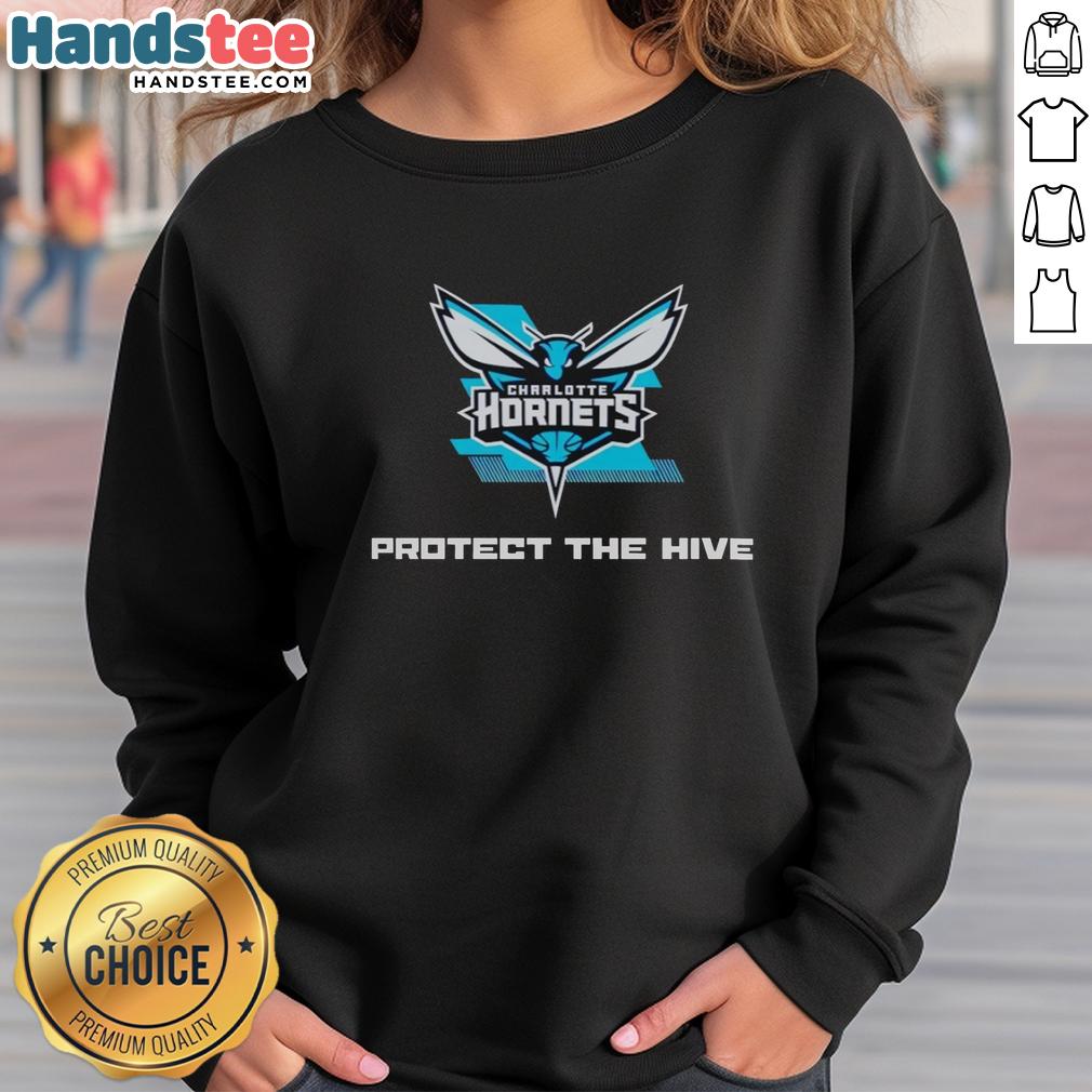 nice-charlotte-hornets-protect-the-hive-fan-rally-teal-sweatshirt-1 Nice Charlotte Hornets Protect The Hive fan rally teal sweatshirt displayed on a hanger with vibrant team logo.