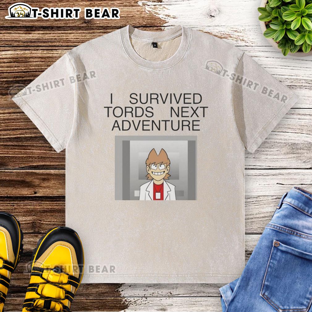 Nice I Survived Tords Next Adventure Washed T Shirt Nice I Survived Tords Next Adventure washed t-shirt displayed on a wooden background, showcasing its vibrant design.
