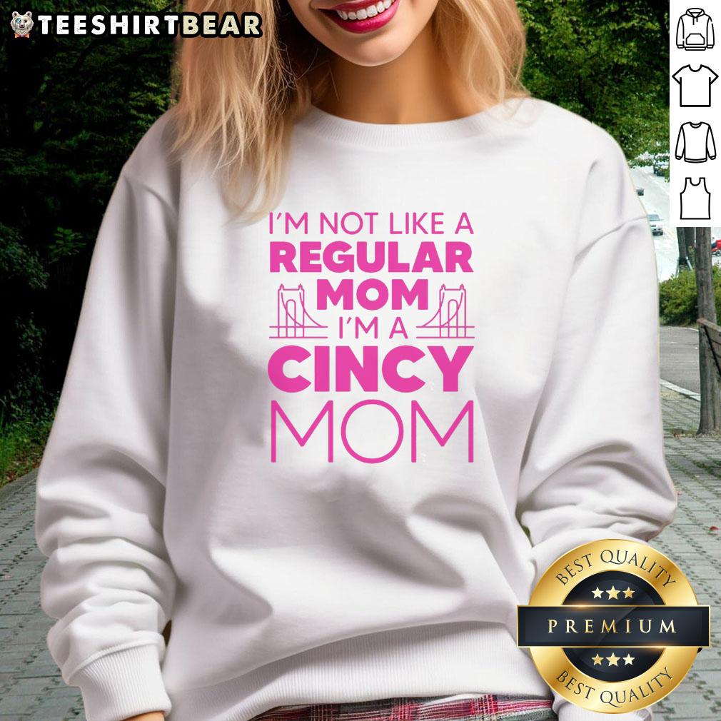 nice-im-not-like-a-regular-mom-sweatshirt Mom wearing 'Nice, I'm Not Like A Regular Mom' sweatshirt, showcasing a fun and trendy style for unique moms.