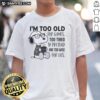 Funny Snoopy T-shirt: 'I'm Too Old For Games, Too Tired To Pretend' with a wise Snoopy graphic.
