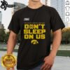Alt Text: Iowa Hawkeyes 2026 NCAA Men's Basketball Tournament March Madness T-shirt featuring bold 'Don't Sleep On Us' design.