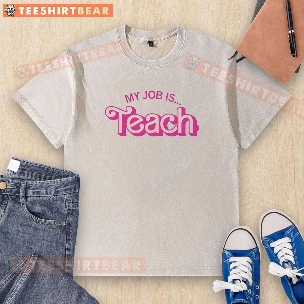 nice-my-job-is-teach-pink-design-washed-t-shirt Alt Text: Pink washed t-shirt with the phrase 'My Job Is to Teach' showcasing a stylish design for educators and teachers.