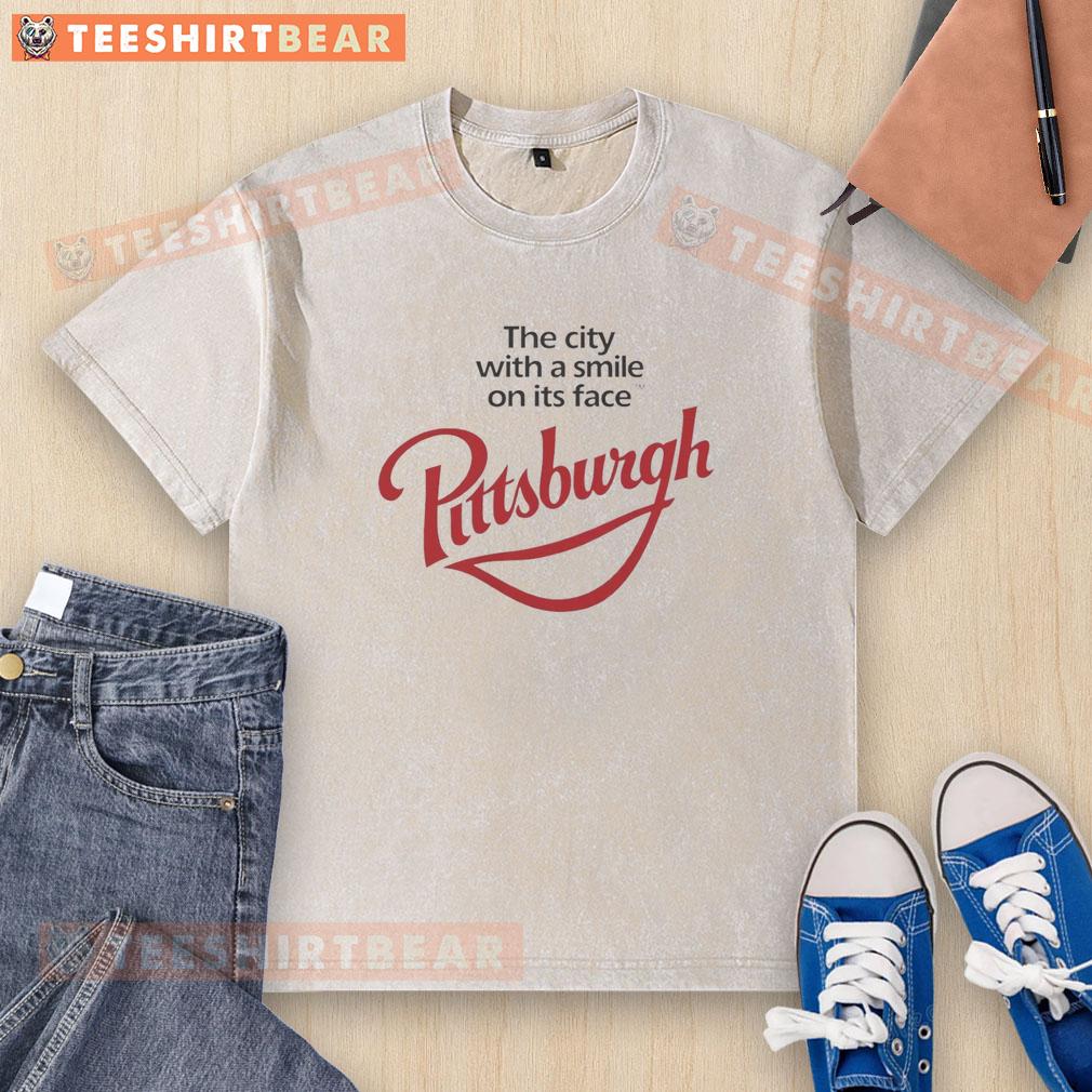 nice-pittsburgh-the-city-with-a-smile-on-its-face-washed-t-shirt Nice Pittsburgh washed t-shirt featuring 'The City With A Smile' design, perfect for fans of Pittsburgh apparel.