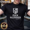 Alt Text: Nice Puck McCrimmon Vegas Golden Knights logo T-shirt featuring vibrant team colors and bold graphics.