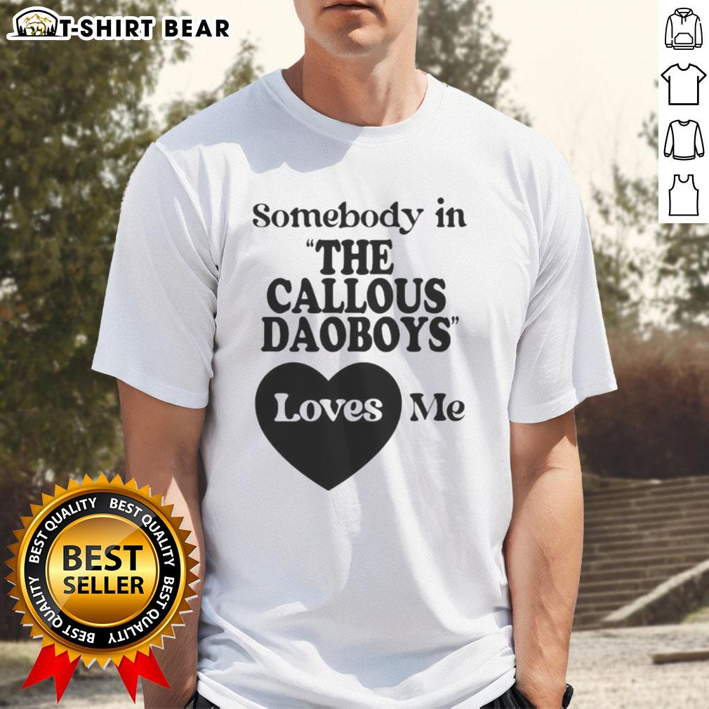 Nice Somebody In The Callous Daoboys Loves Me T Shirt Alt Text: Nice Somebody In The Callous Daoboys Loves Me T-Shirt featuring bold graphics and colorful design for fans.