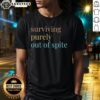 Alt Text: Nice Surviving Purely Out Of Spite T-Shirt featuring bold text design on a casual black tee.