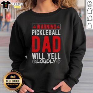 Original Warning Pickleball Dad Will Yell Loudly sweatshirt design featuring bold text and playful graphics.