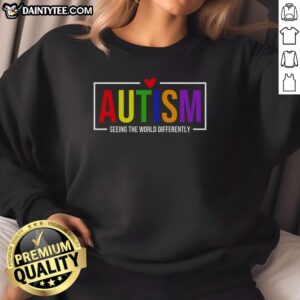 Alt Text: Funny autism sweatshirt featuring a unique design illustrating seeing the world differently with vibrant colors.