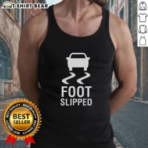 Happy person wearing a 'Good Foot Slipped' tank top, showcasing a playful design and cheerful vibe in a sunny outdoor setting.