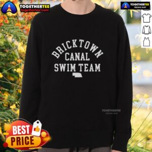 Alt Text: Good Bricktown Canal Swim Team Nebraska sweatshirt featuring a vibrant design and team logo in bold colors.