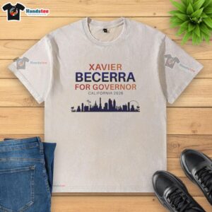 Official Xavier Becerra Governor 2026 California skyline washed t-shirt featuring iconic city landmarks.