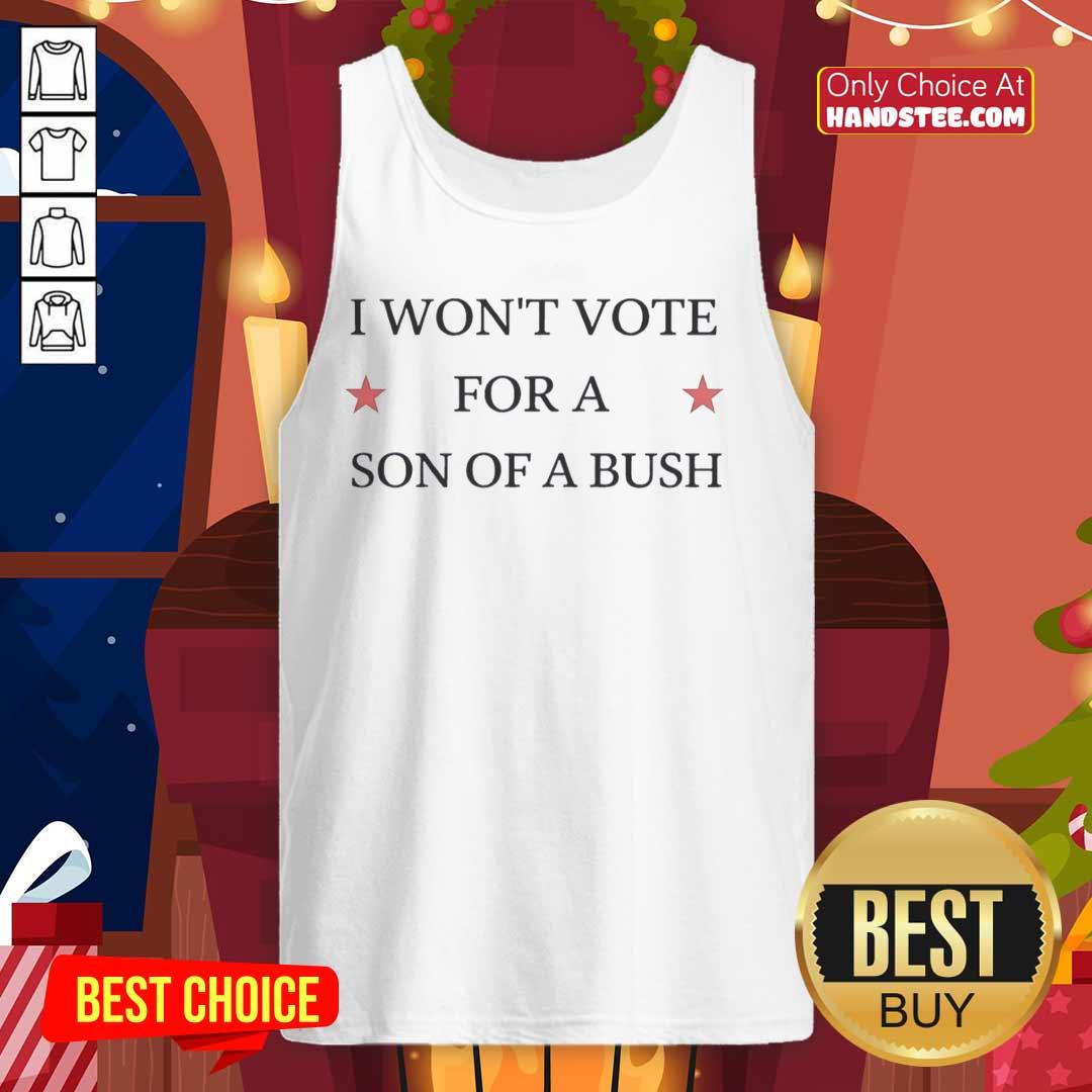 official-drew-barrymore-wearing-i-wont-vote-for-a-son-of-a-bush-tank-top Drew Barrymore wearing a 'I Won't Vote For A Son Of A Bush' tank top at an event, showcasing her political stance.