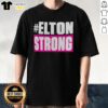 Official Elton Strong T-Shirt featuring bold graphics and vibrant colors, perfect for fans of Elton John.