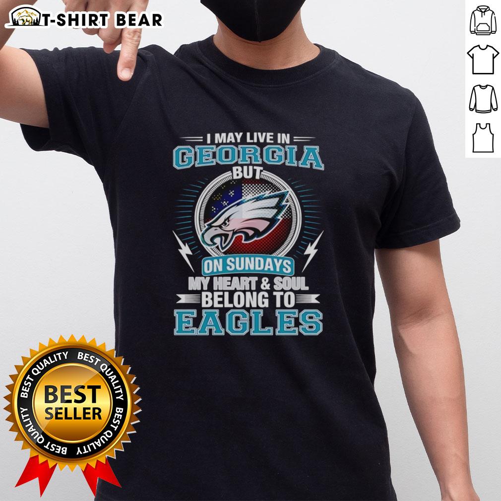 Official Philadelphia Eagles I May Live In Georgia But On Sundays My Heart And Soul Belong To Eagles T-Shirt Official Philadelphia Eagles t-shirt featuring 'I May Live In Georgia But My Heart Belongs To Eagles' slogan.