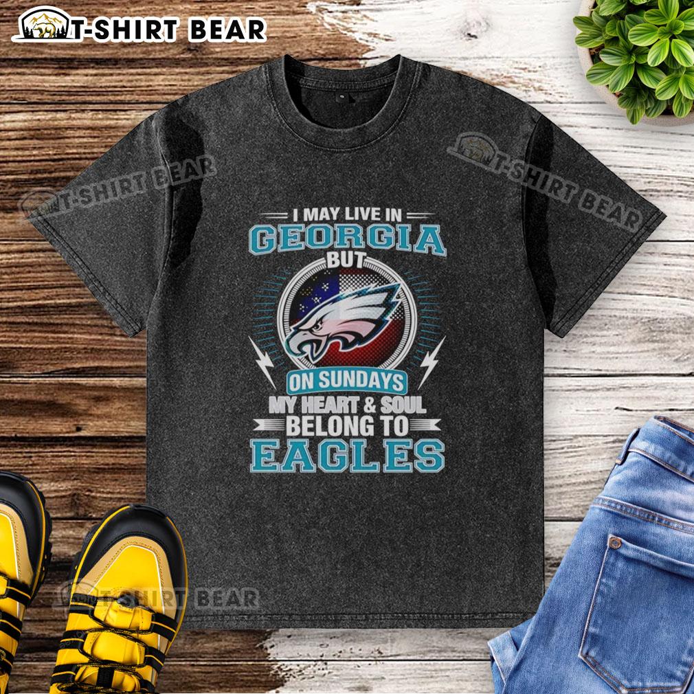 Official Philadelphia Eagles I May Live In Georgia But On Sundays My Heart And Soul Belong To Eagles Washed T-Shirt Official Philadelphia Eagles washed t-shirt with 'I may live in Georgia, but on Sundays my heart belongs to Eagles' slogan.