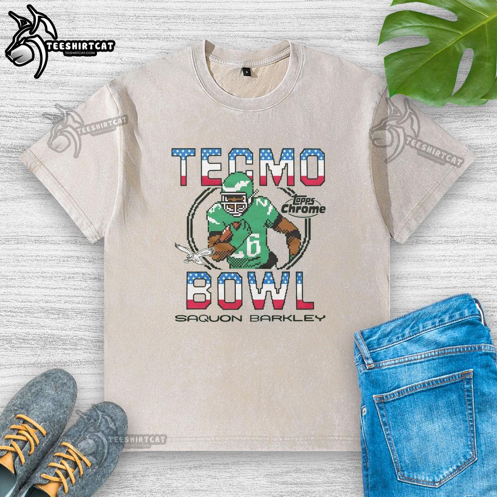 official-tecmo-bowl-x-topps-chrome-eagles-saquon-barkley-washed-t-shirt Alt Text: Official Tecmo Bowl X Topps Chrome Eagles Saquon Barkley washed t-shirt featuring vibrant team graphics.