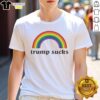 Official Trump Sucks Rainbow Funny T-Shirt featuring colorful text and a humorous design for political satire enthusiasts.
