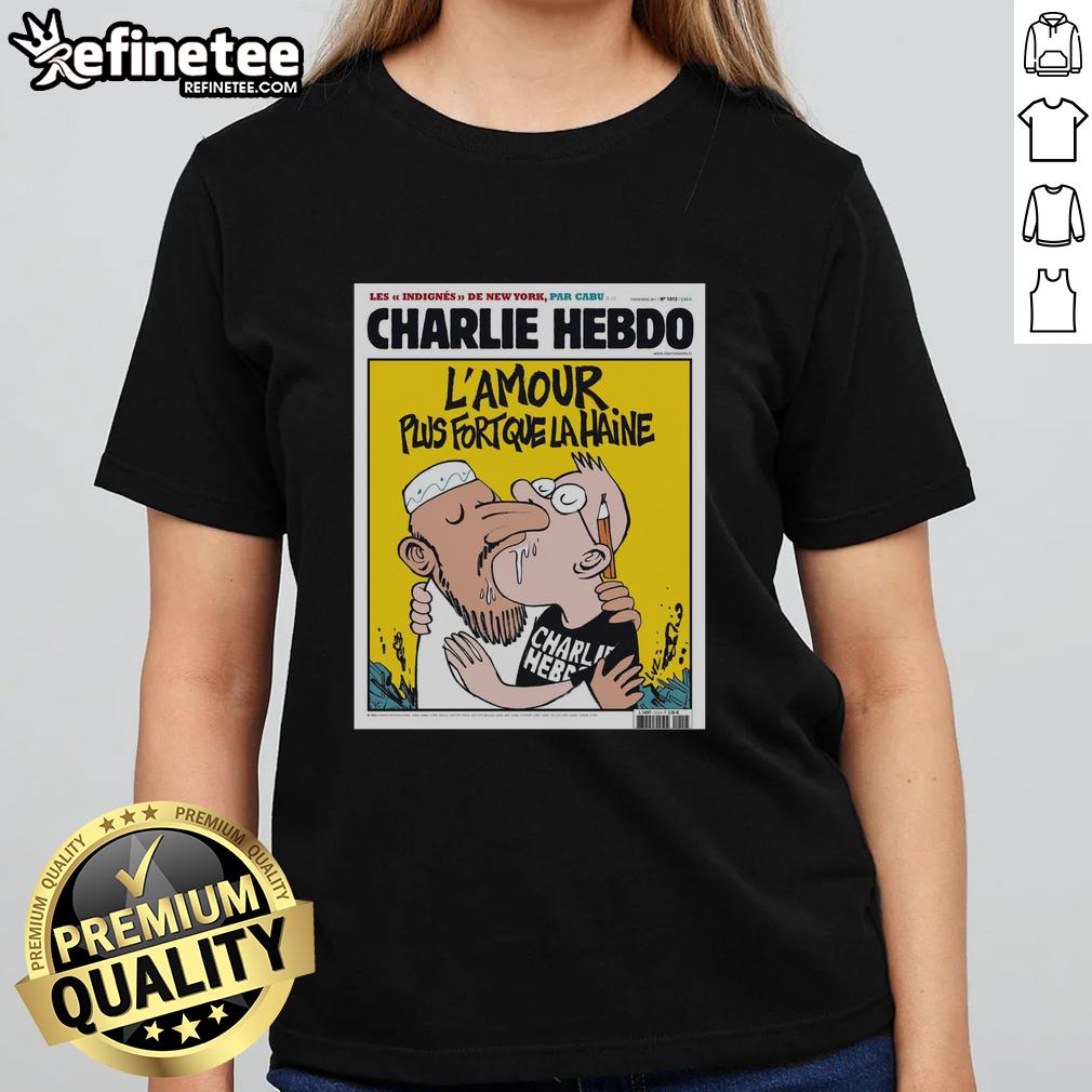 official-two-men-kissing-charlie-hebdo-lamour-plus-fort-que-la-haine-ladies-tee Alt Text: Official Charlie Hebdo tee featuring two men kissing, symbolizing 'L'Amour Plus Fort Que La Haine' message of love.
