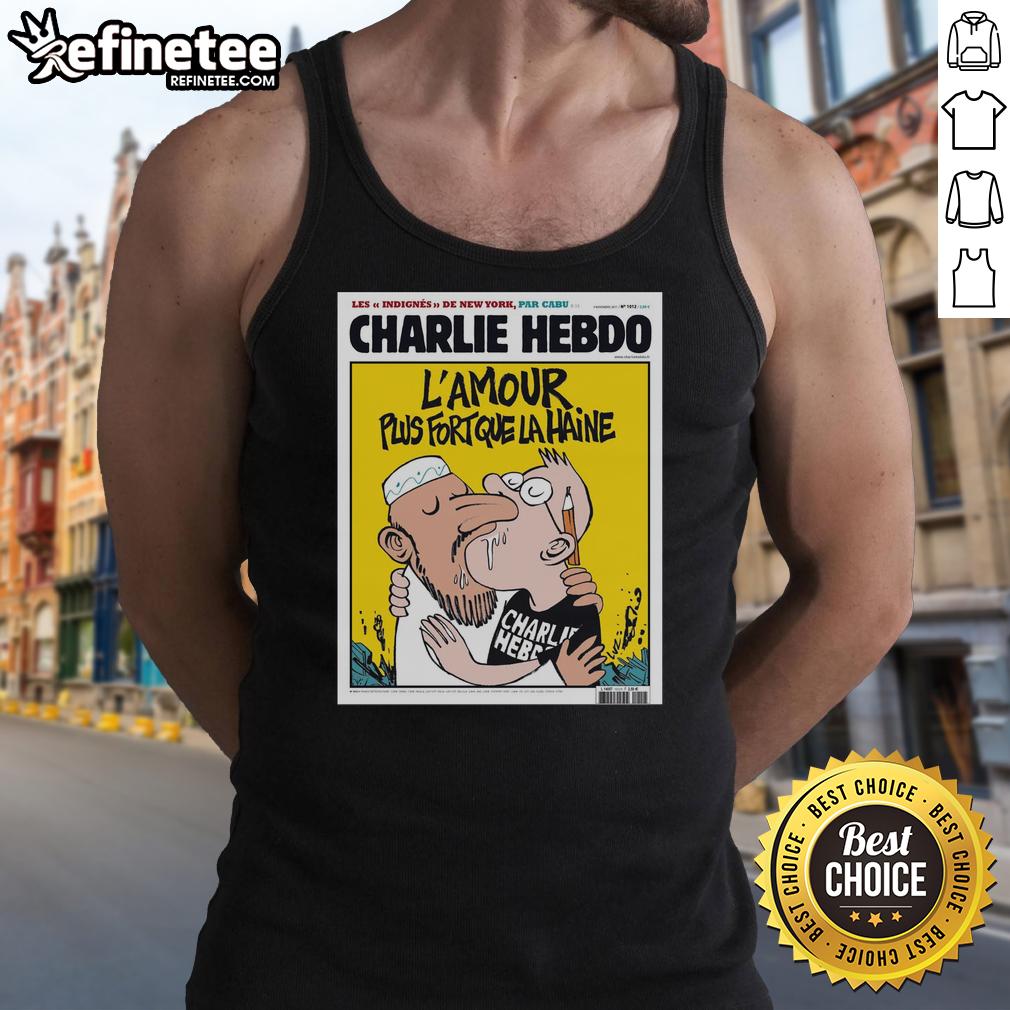 official-two-men-kissing-charlie-hebdo-lamour-plus-fort-que-la-haine-tank-top Alt Text: Two men kissing in a tank top featuring the L'Amour Plus Fort Que La Haine design from Charlie Hebdo.