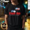 Alt Text: Original Farm Aid Keep America Growing tractor and American flag T-shirt design, promoting sustainable farming.