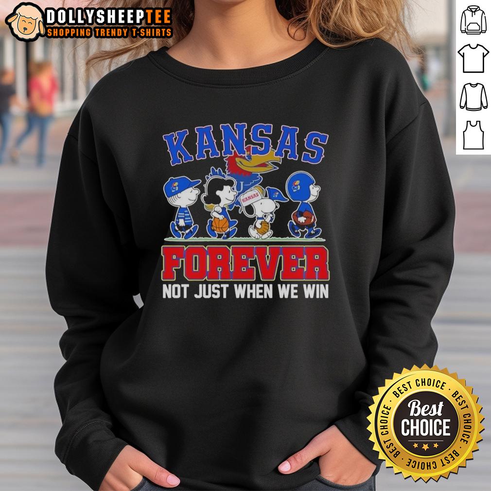 Original Peanuts X Kansas Jayhawks Forever Fan Not Just When We Win Cartoon Characters Sweatshirt Original Peanuts X Kansas Jayhawks sweatshirt featuring cartoon characters with 'Forever Fan' slogan. Perfect for fans!