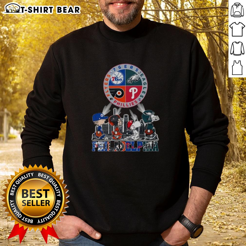 Original Philadelphia Sports Teams Snoopy 76ers Eagles Flyers Phillies Sweatshirt Original Philadelphia Sports Teams Snoopy sweatshirt featuring 76ers, Eagles, Flyers, and Phillies logos.