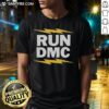 Original Run DMC Electric T-Shirt featuring vibrant colors and iconic logo, perfect for hip-hop fashion enthusiasts.