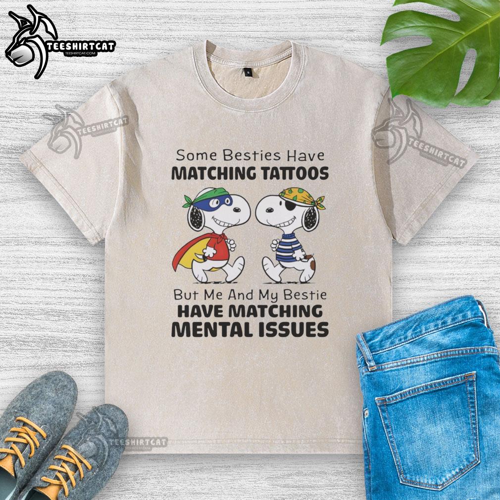 original-snoopy-some-besties-have-matching-tattoos-but-me-and-my-bestie-have-matching-mental-issues-washed-t-shirt Original Snoopy t-shirt featuring a humorous quote about matching mental issues with best friends.