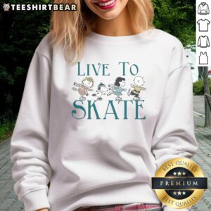 Adorable Cute Peanuts Live to Skate sweatshirt featuring colorful graphics and a cozy design for skateboarding enthusiasts.