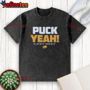 Premium Buffalo Sabres Puck Yeah Playoffs Hockey 2026 logo on a washed t-shirt, perfect for fans and game day.