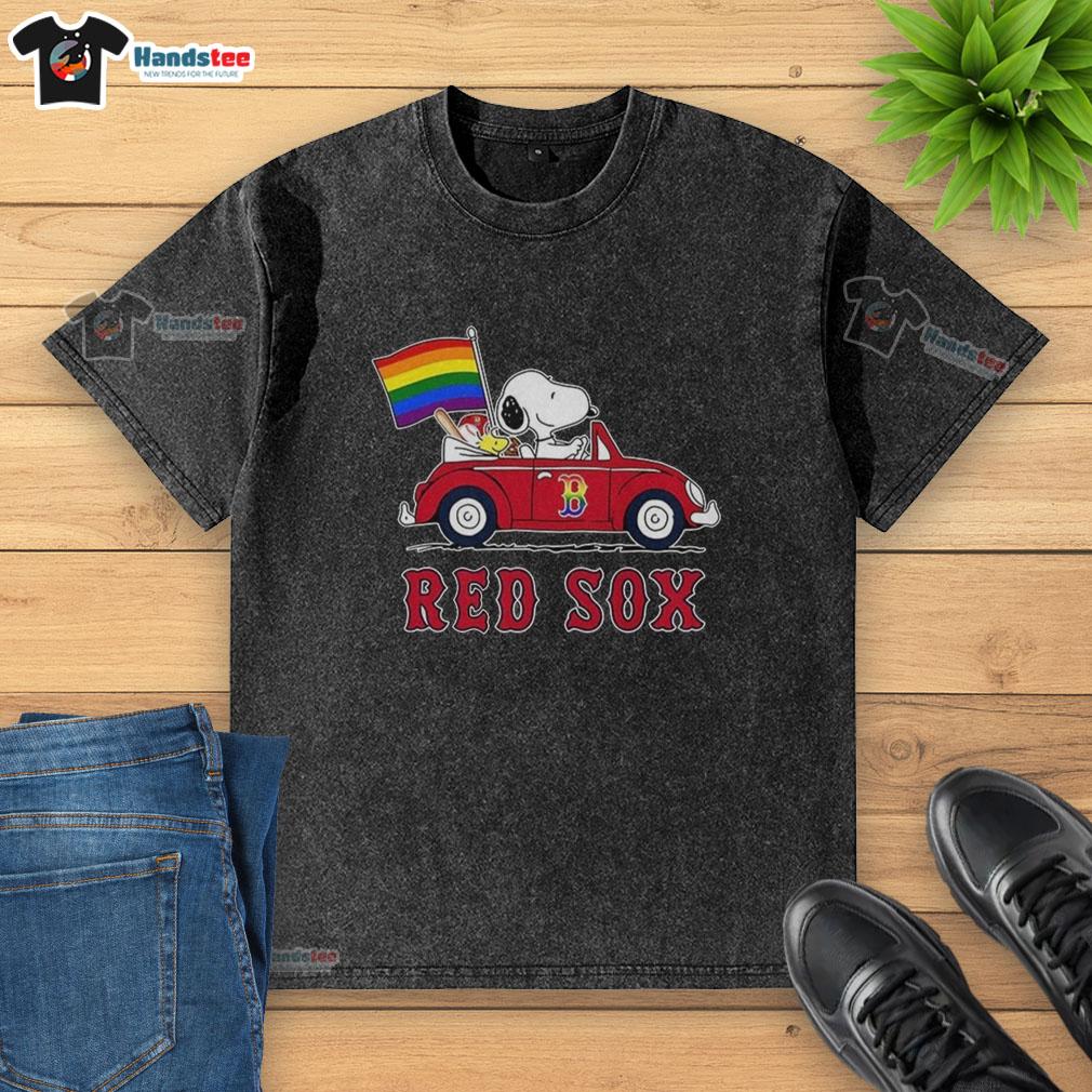premium-boston-red-sox-x-snoopy-and-woodstock-driving-car-rainbow-flag-washed-t-shirt Alt Text: Premium Boston Red Sox x Snoopy and Woodstock driving a car with a rainbow flag on a washed t-shirt design.