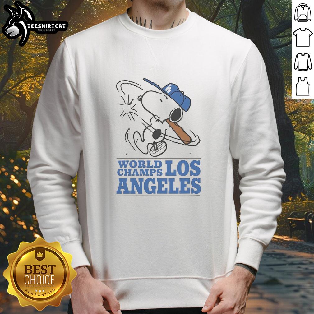 premium-snoopy-x-los-angeles-dodgers-world-champs-cartoon-sweatshirt Alt Text: Premium Snoopy X Los Angeles Dodgers World Champs cartoon sweatshirt featuring Snoopy celebrating with Dodgers logo.