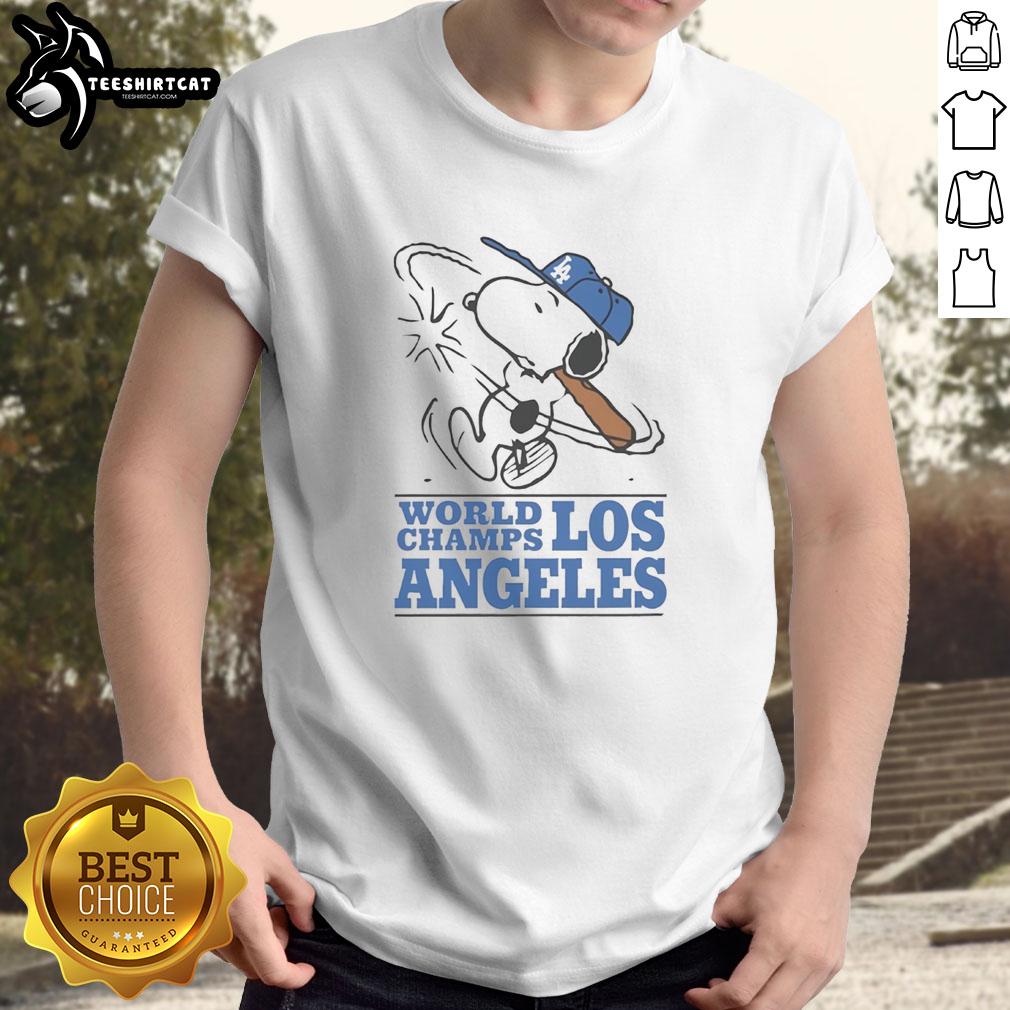 premium-snoopy-x-los-angeles-dodgers-world-champs-cartoon-t-shirt Alt Text: Premium Snoopy X Los Angeles Dodgers World Champs Cartoon T-Shirt featuring Snoopy celebrating Dodgers victory.
