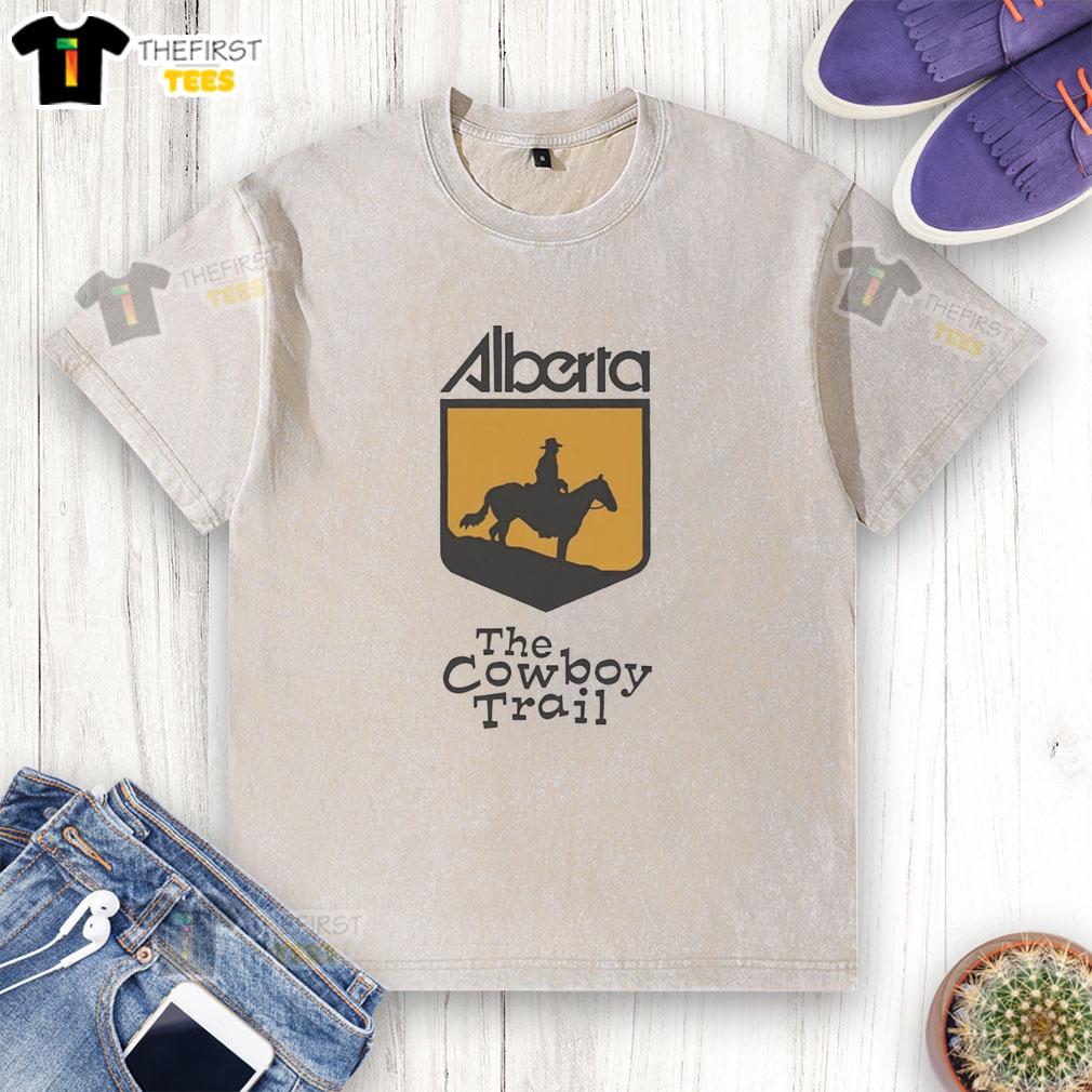 pretty-alberta-the-cowboy-trail-logo-washed-t-shirt Alt Text: Pretty Alberta Cowboy Trail logo printed on a stylish washed t-shirt, perfect for outdoor adventures and casual wear.