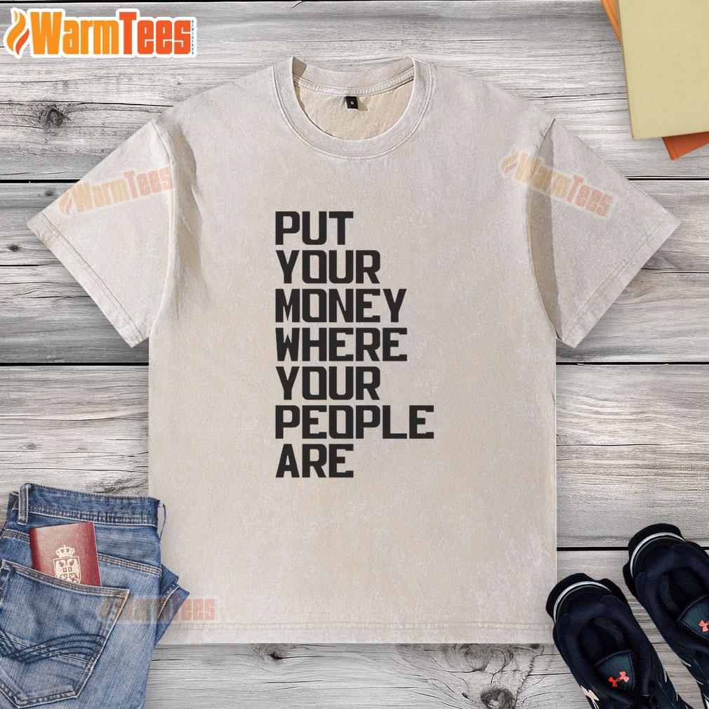 pretty-put-your-money-where-your-people-are-washed-t-shirt Pretty Put Your Money Where Your People Are washed t-shirt displayed on a wooden background, showcasing trendy design.