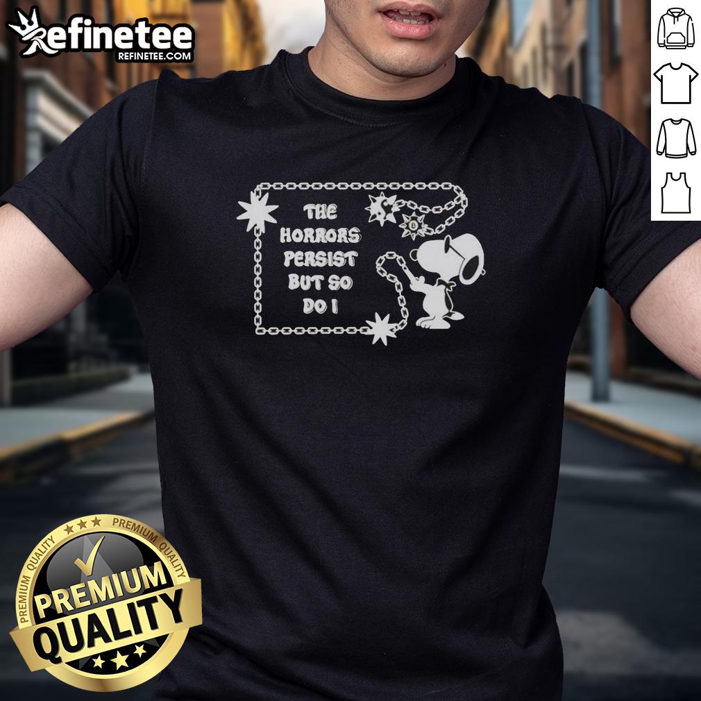 pretty-snoopy-the-horrors-persist-but-so-do-i-t-shirt Alt Text: Pretty Snoopy The Horrors Persist But So Do I T-Shirt featuring a colorful Snoopy graphic and motivational text.