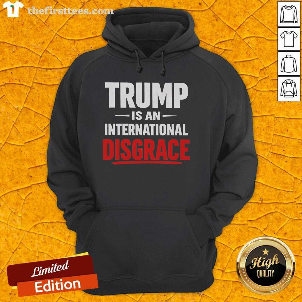 pretty-trump-is-an-international-disgrace-hoodie Alt Text: Pretty Trump is an International Disgrace hoodie featuring bold graphic design and vibrant colors for impactful statements.