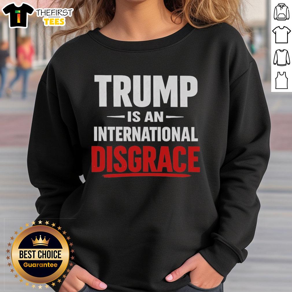 pretty-trump-is-an-international-disgrace-sweatshirt Pretty Trump Is An International Disgrace sweatshirt featuring a bold graphic and vibrant colors, perfect for statement fashion.