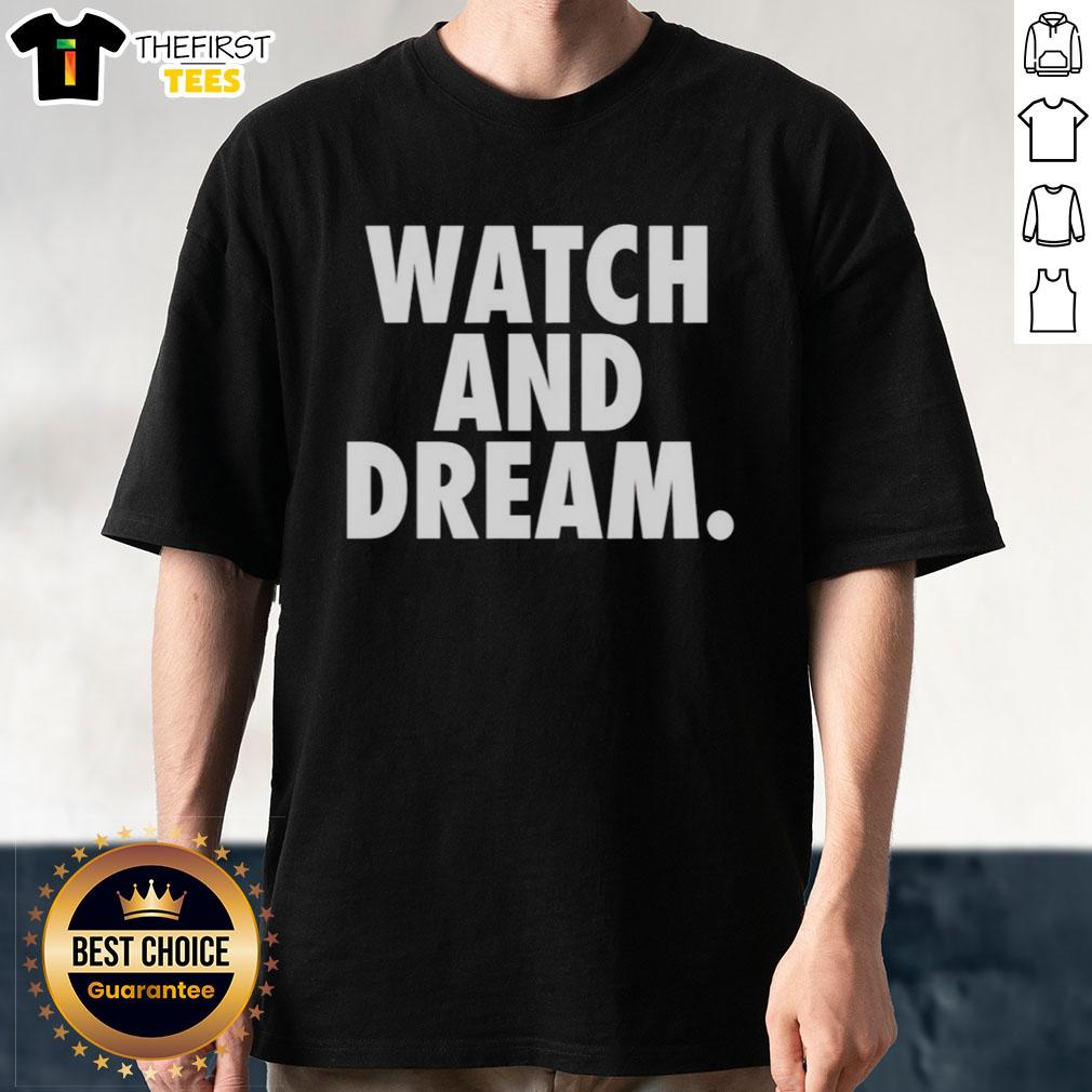 pretty-watch-and-dream-t-shirt Stylish watch and 'Dream' T-shirt on a wooden surface, perfect for casual fashion enthusiasts.