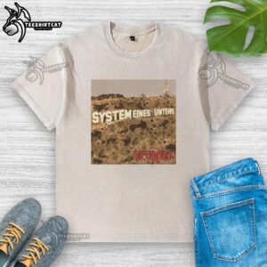 Nice System Eines Untens Toxicity album cover printed on a washed t-shirt featuring vibrant graphics and unique design.