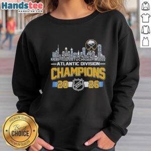 Alt Text: 2026 NHL Atlantic Division Champions Buffalo Sabres sweatshirt featuring city skyline and player names.